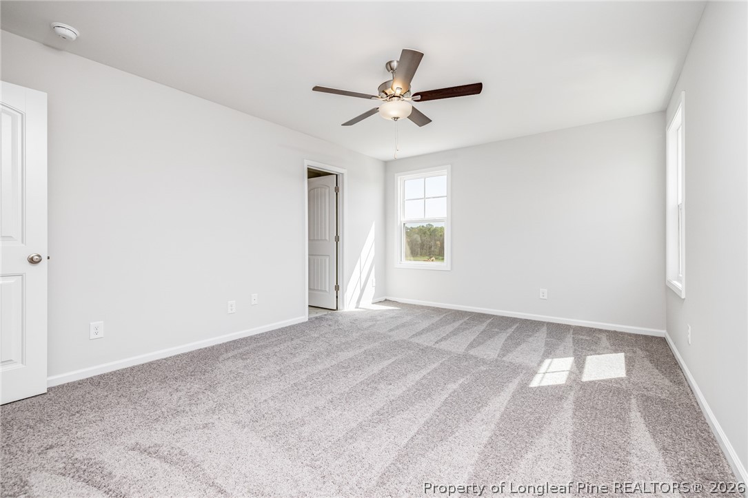 5413 Short Leaf Road Fayetteville, NC 28311 - Photo 20 of 33 a view of an empty room with a window