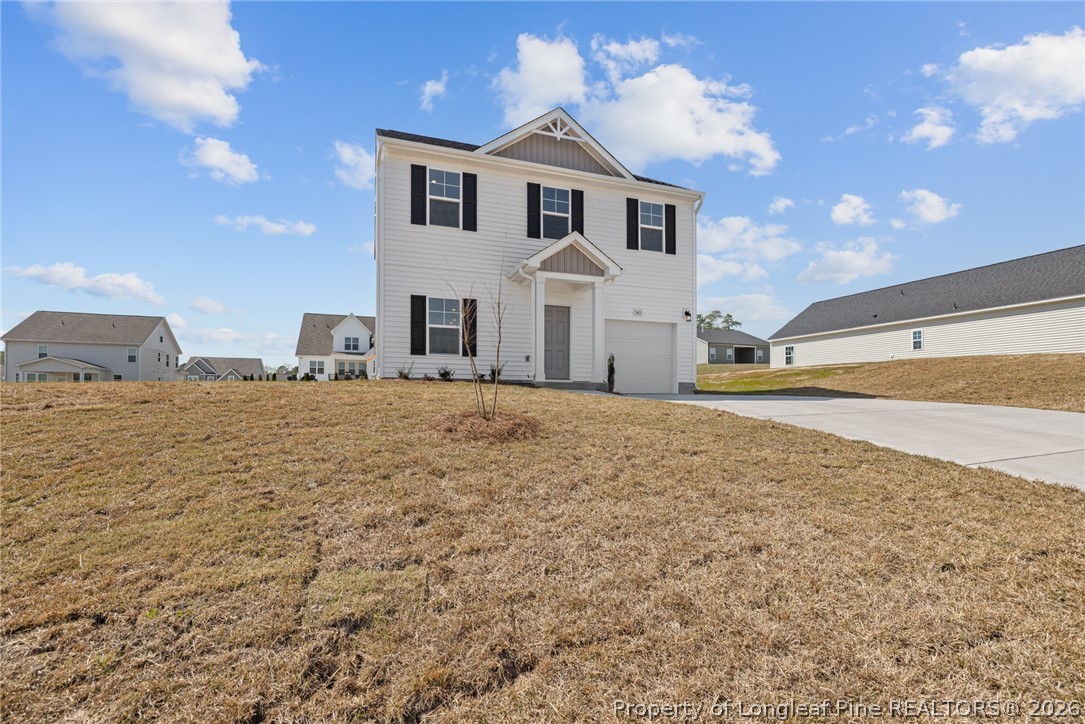 5413 Short Leaf Road Fayetteville, NC 28311 - Photo 30 of 33 a view of a house with a yard