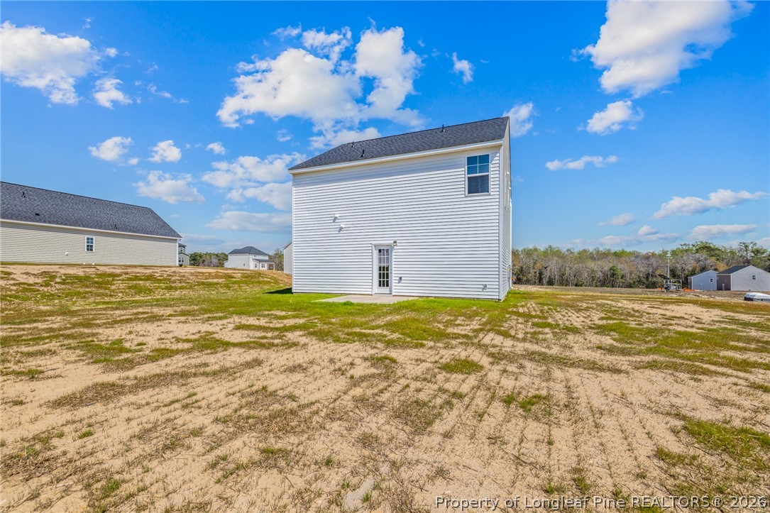 5413 Short Leaf Road Fayetteville, NC 28311 - Photo 33 of 33 a view of a house with a yard