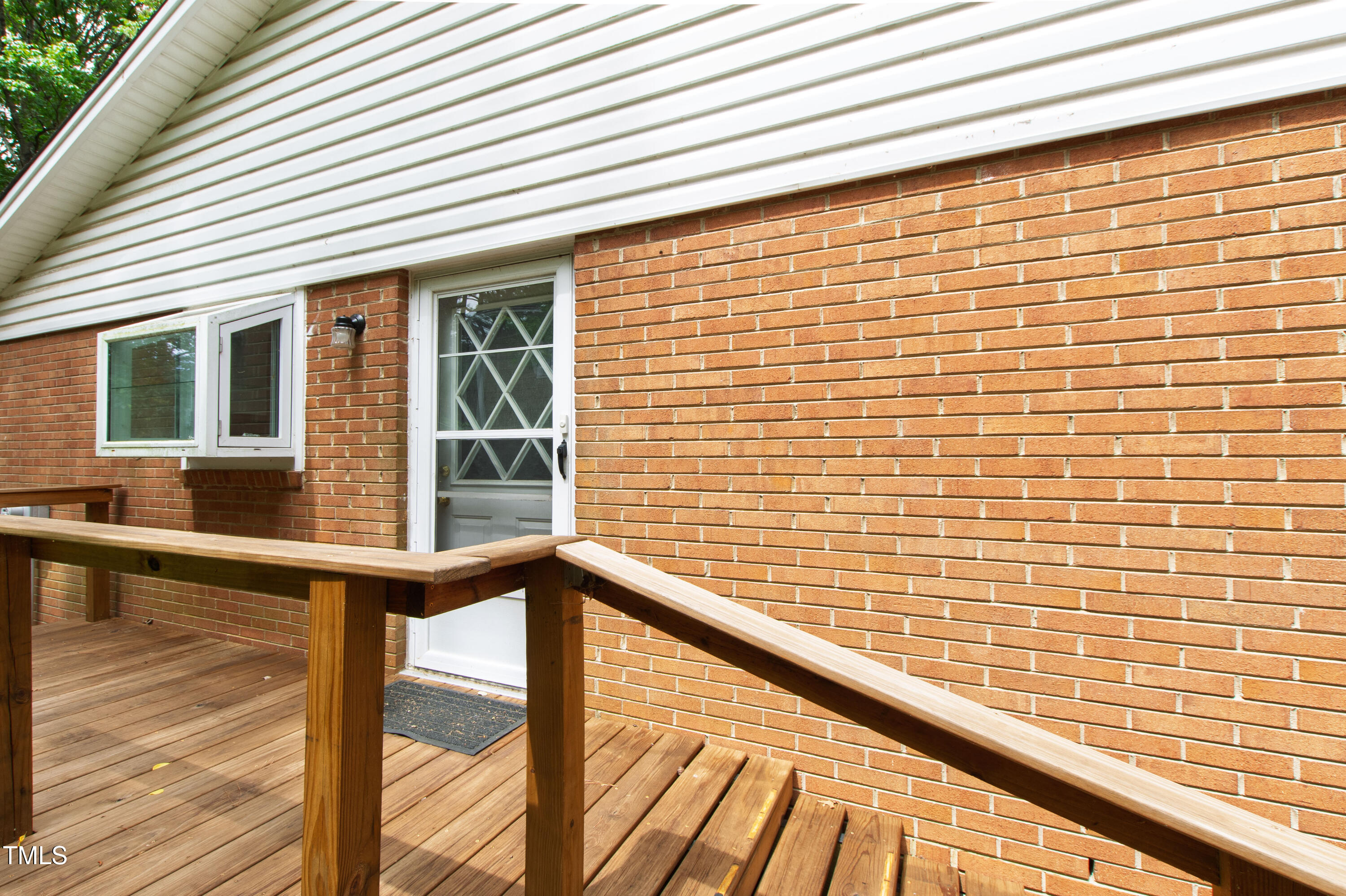 3517 Morningside Drive Raleigh, NC 27607 - Photo 4 of 9 a view of a balcony with wooden floor