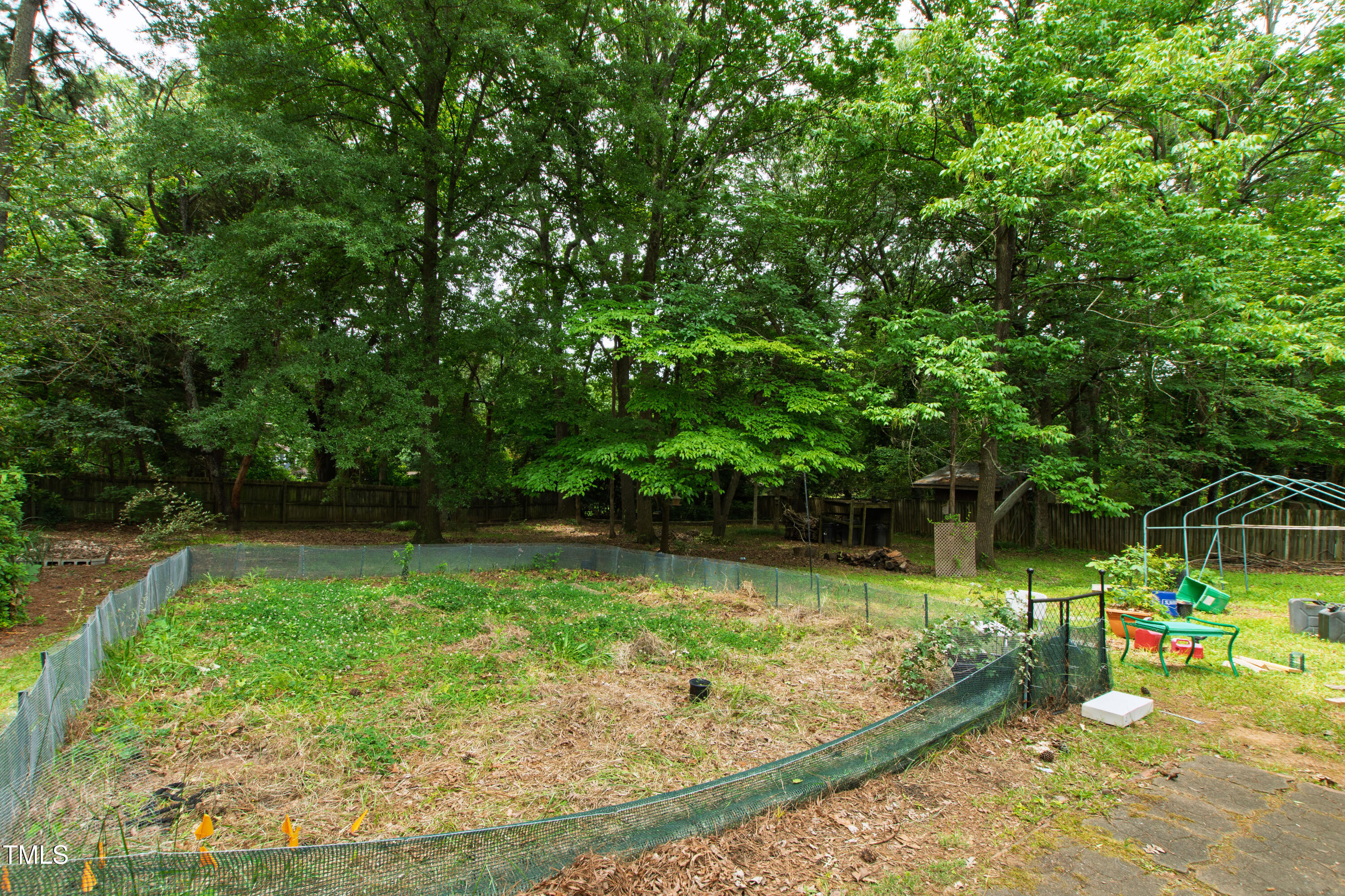 3517 Morningside Drive Raleigh, NC 27607 - Photo 7 of 9 a view of a swimming pool with a patio