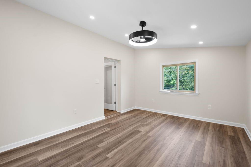 175 McMurray Road Pittsburgh, PA 15241 - Photo 13 of 45 an empty room with a window and a fan