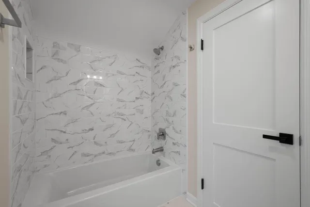 a bathroom with a bathtub