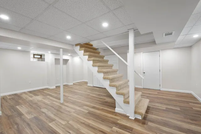 a view of entryway with wooden floor
