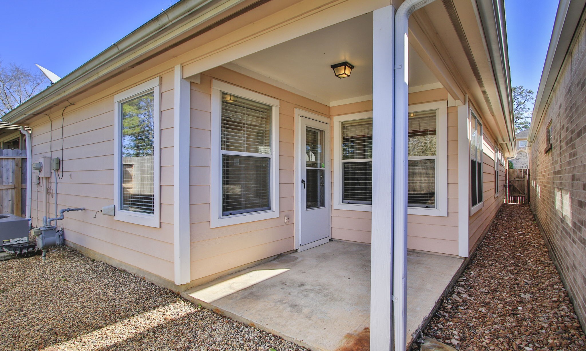 2818 Crescent Star Road Spring, TX 77388 - Photo 17 of 20 a view of a house with more windows and brick walls