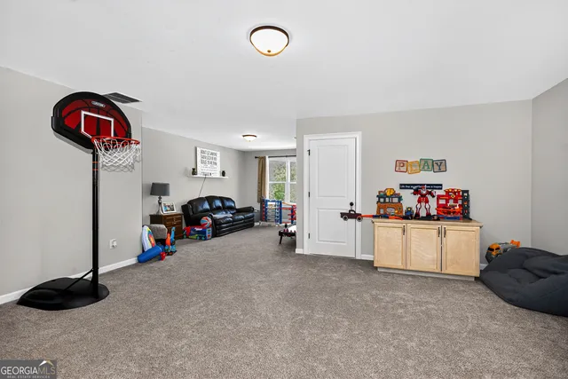 a view of a backyard with furniture