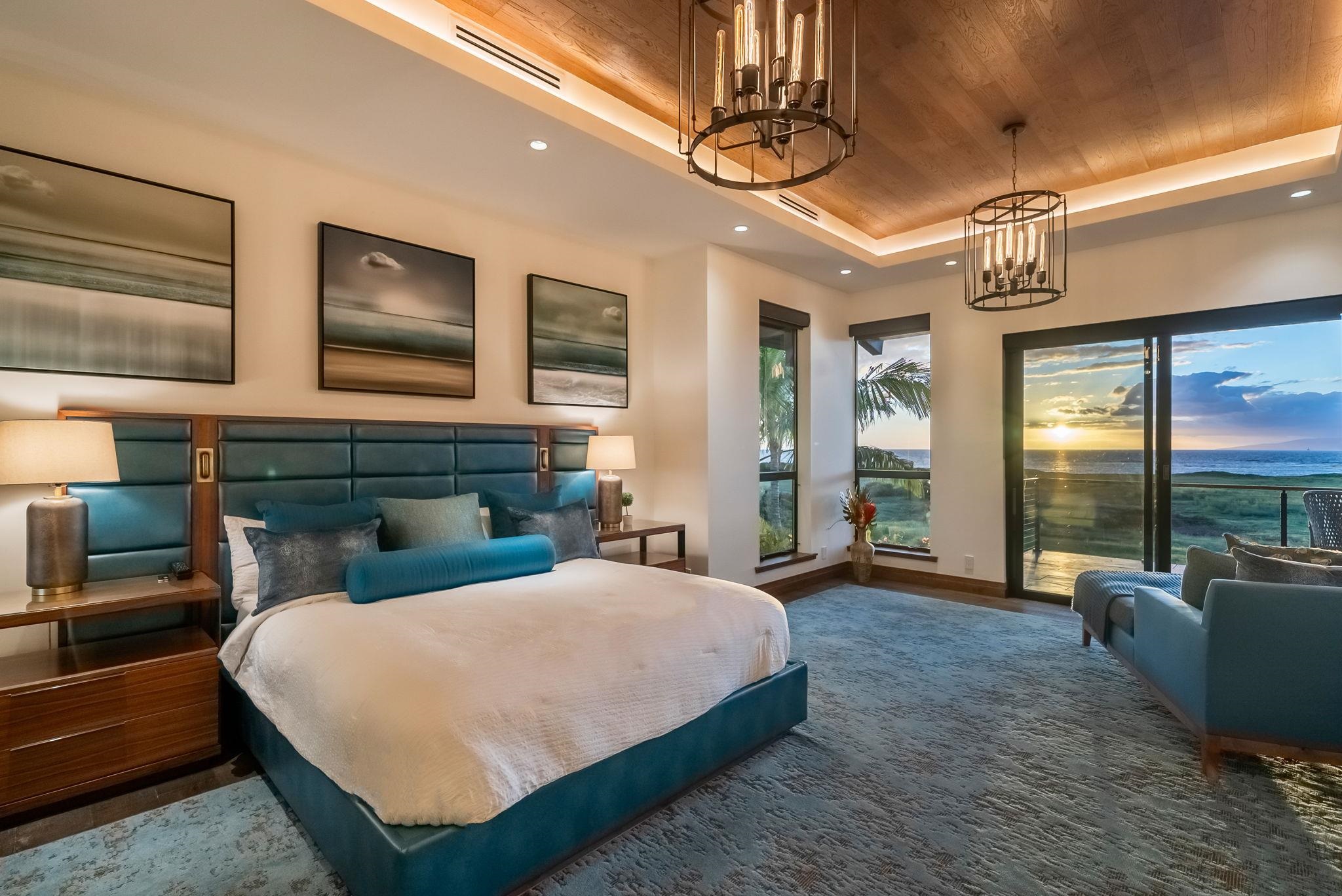 860 South Kihei Road Kihei, HI 96753 - Photo 19 of 49 a bedroom with a large bed and a tv