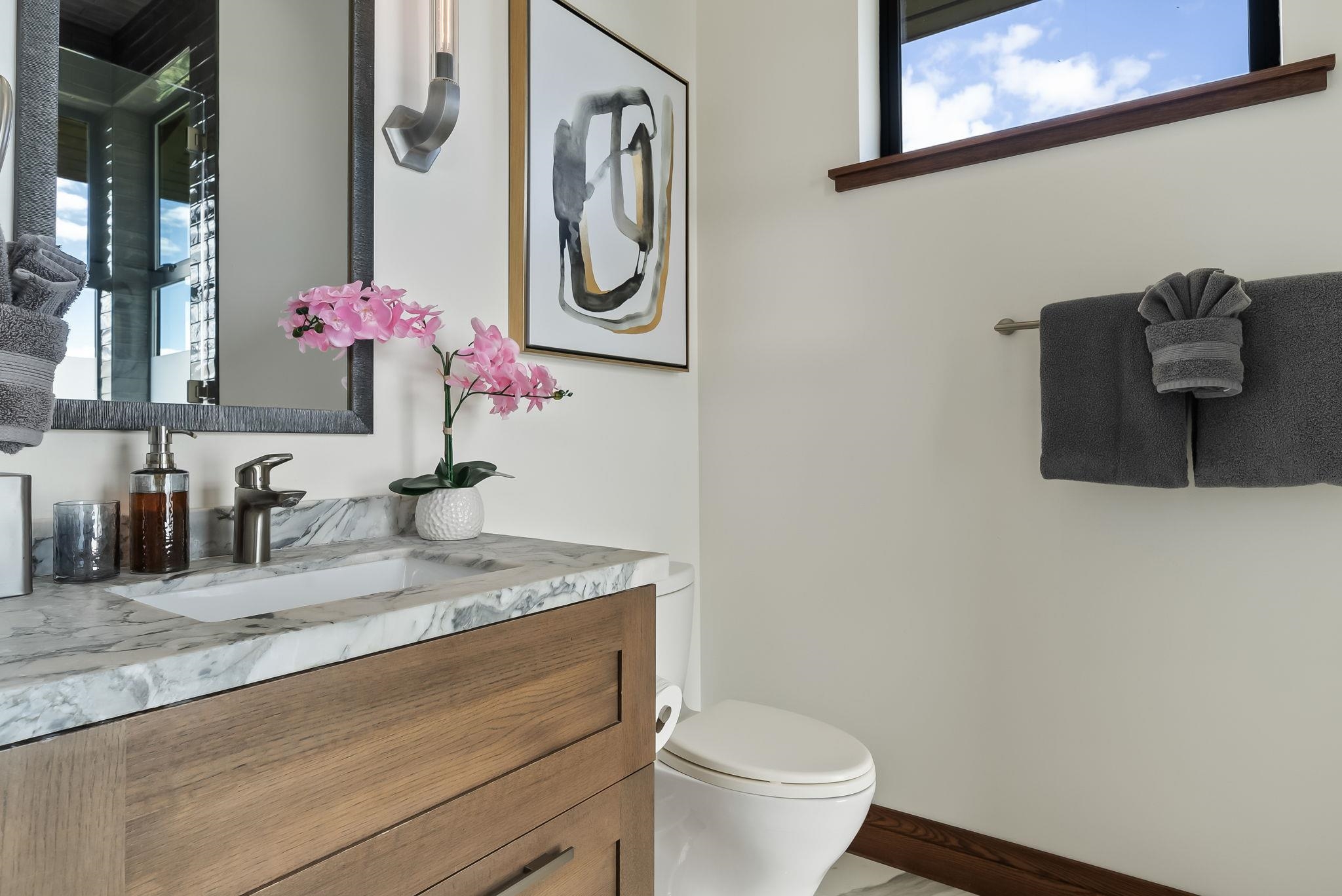 860 South Kihei Road Kihei, HI 96753 - Photo 38 of 49 a bathroom with a granite countertop sink a toilet and mirror