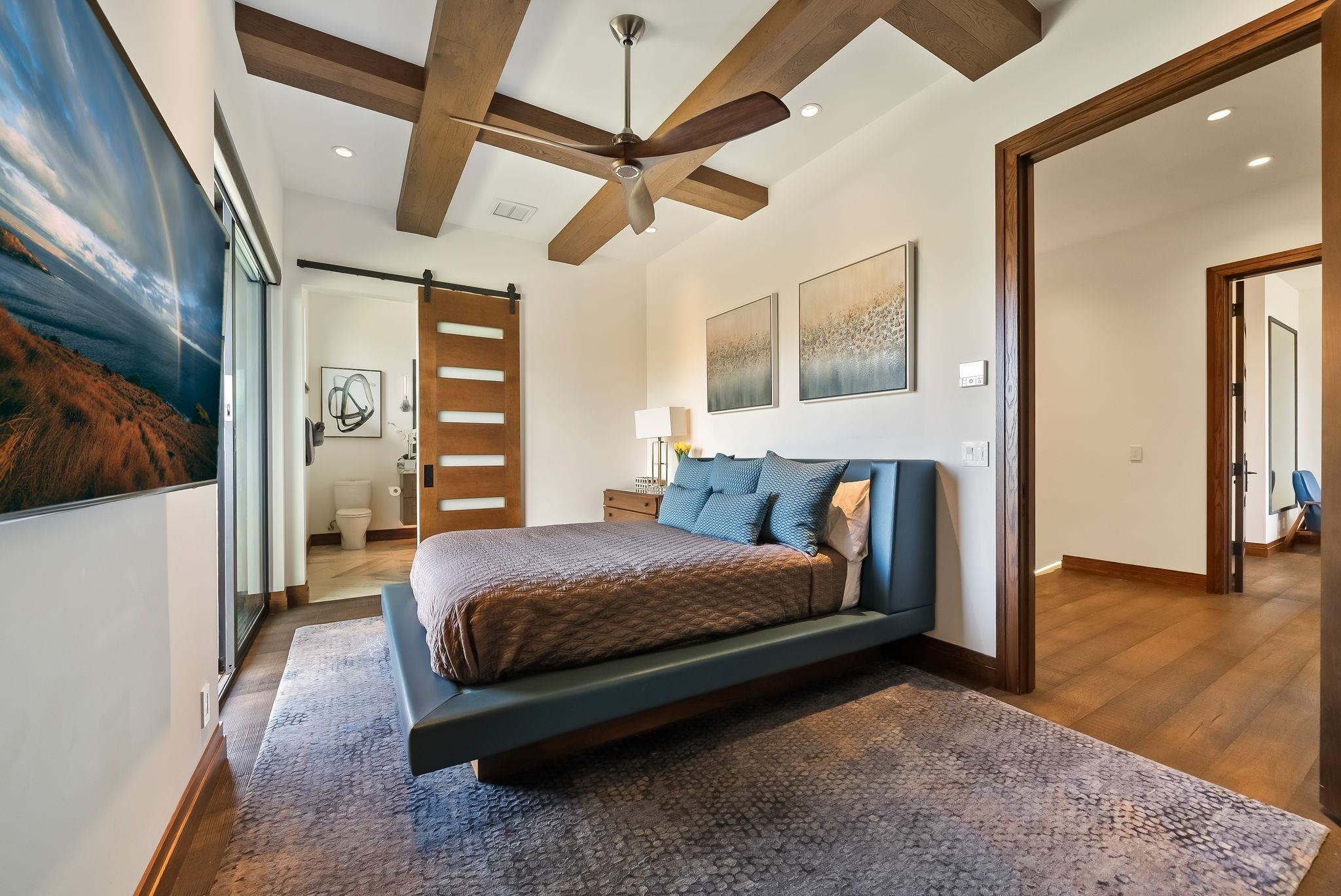 860 South Kihei Road Kihei, HI 96753 - Photo 39 of 49 a spacious bedroom with a bed and a large window