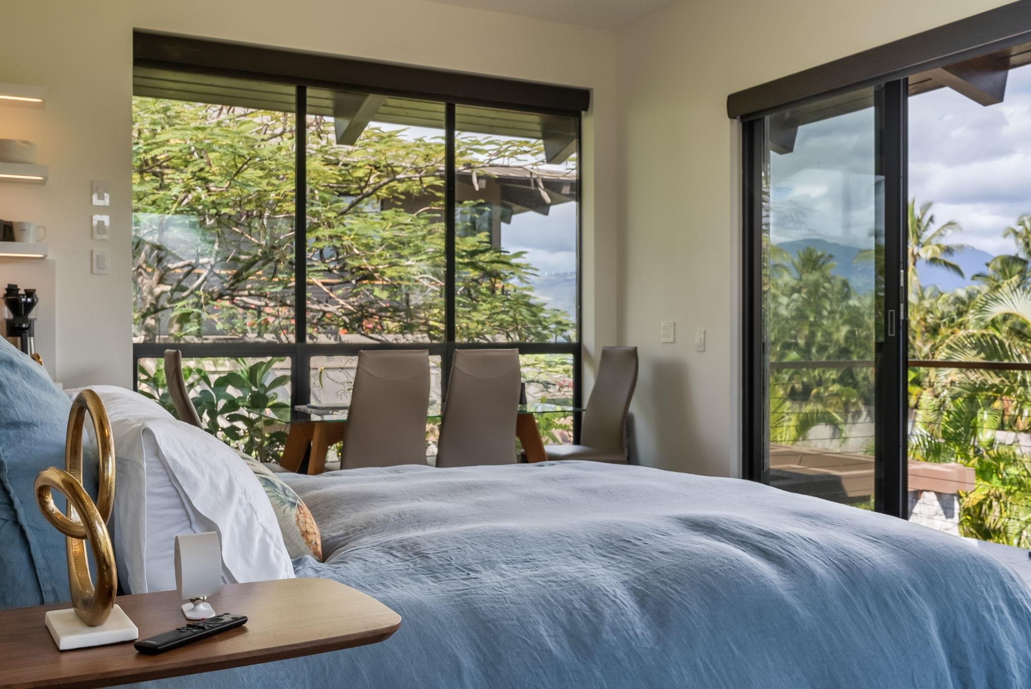 860 South Kihei Road Kihei, HI 96753 - Photo 48 of 49 a bedroom with a large bed and a large window