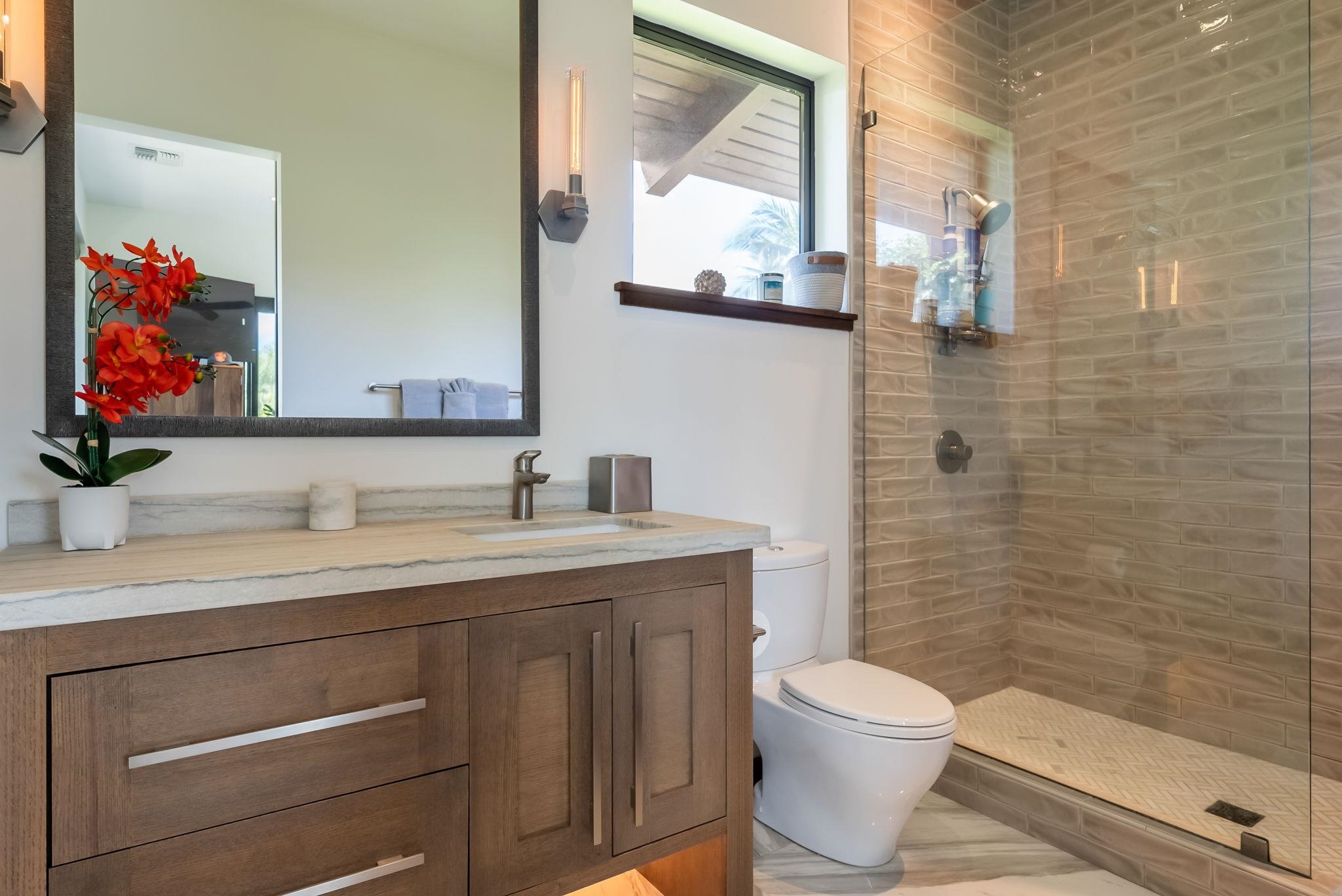 860 South Kihei Road Kihei, HI 96753 - Photo 49 of 49 a bathroom with a granite countertop toilet sink and mirror
