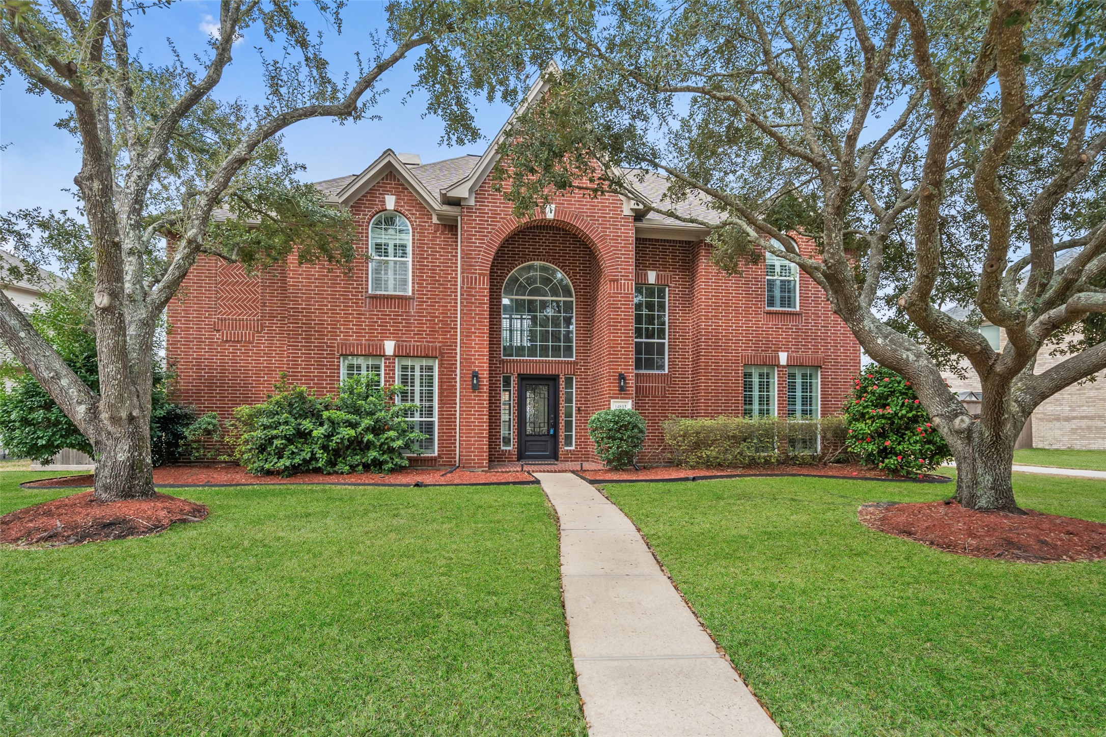 14803 Ramblebrook Humble, TX 77396 - Photo 13 of 45 a front view of a house with garden