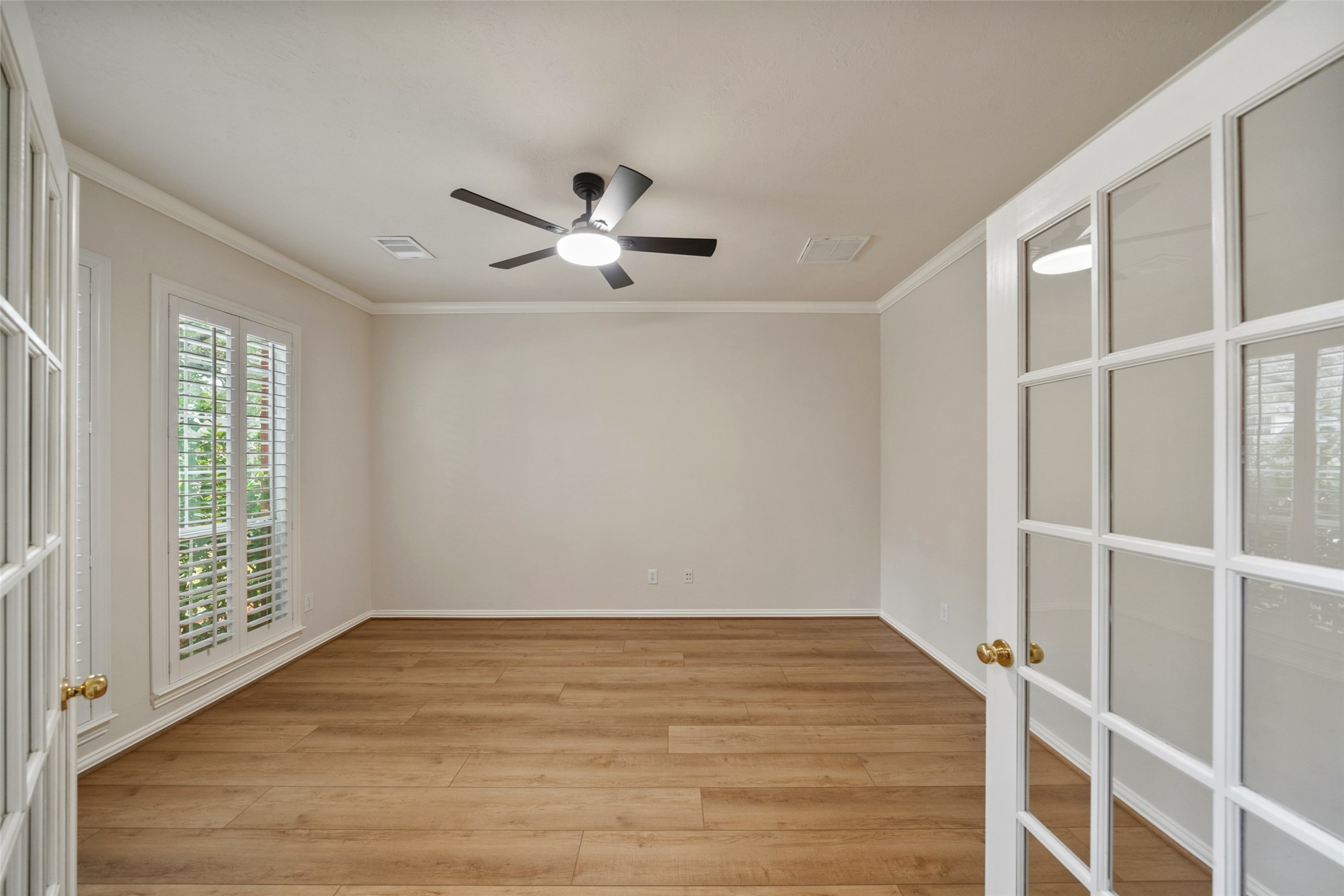 14803 Ramblebrook Humble, TX 77396 - Photo 15 of 45 wooden floor in an empty room with a window