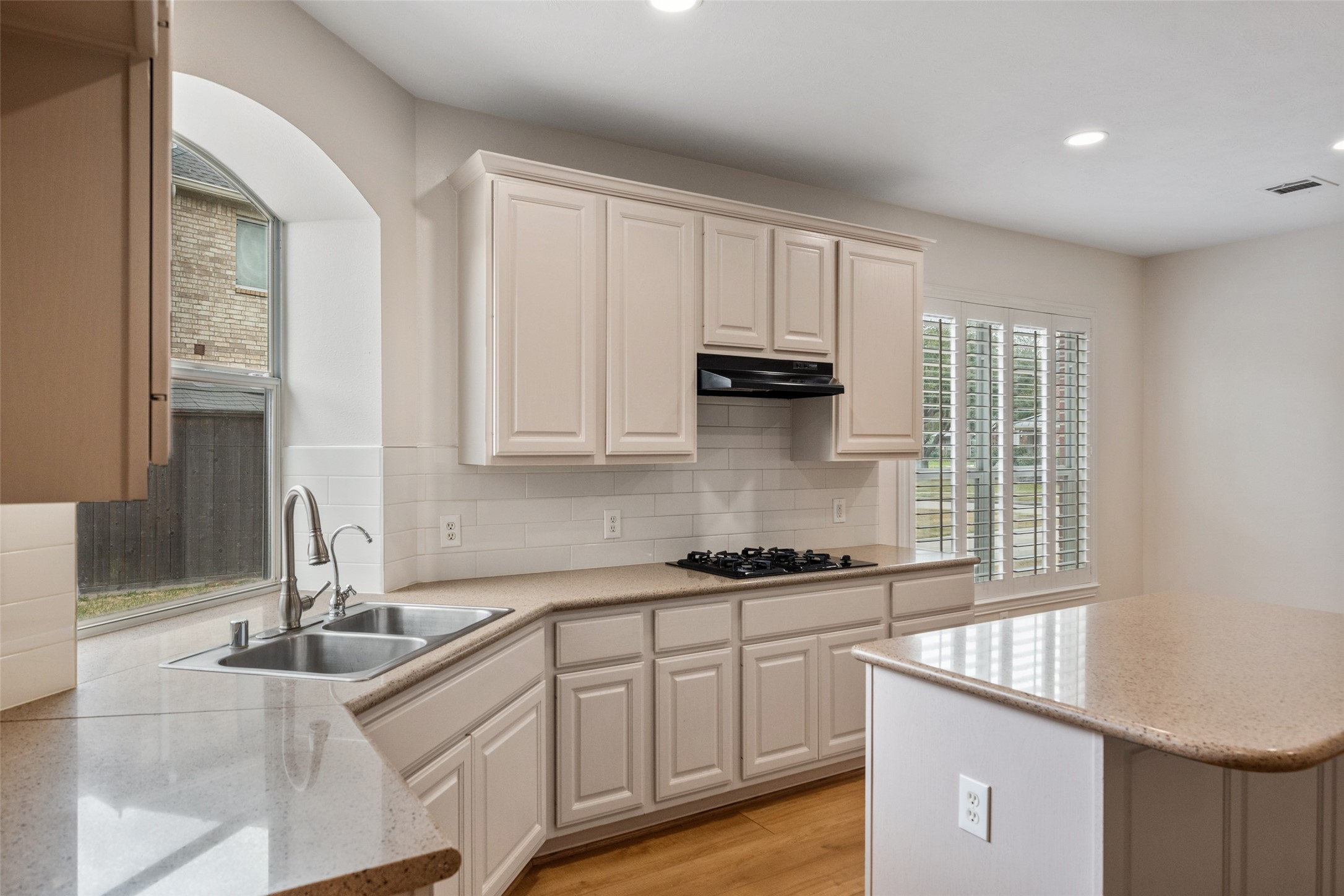 14803 Ramblebrook Humble, TX 77396 - Photo 21 of 45 a kitchen with stainless steel appliances granite countertop a sink stove and cabinets