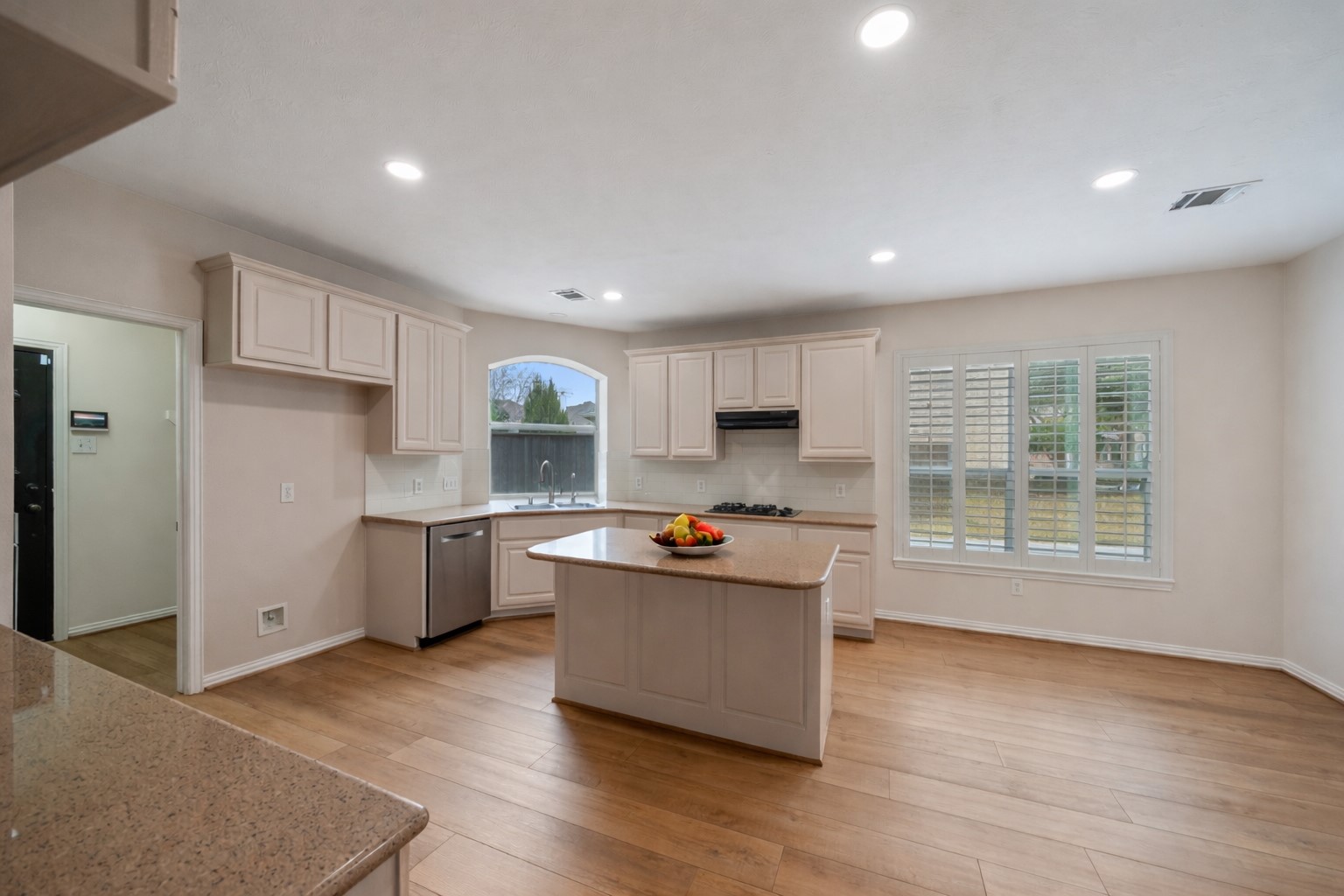 14803 Ramblebrook Humble, TX 77396 - Photo 23 of 45 a kitchen with stainless steel appliances granite countertop a stove and a refrigerator