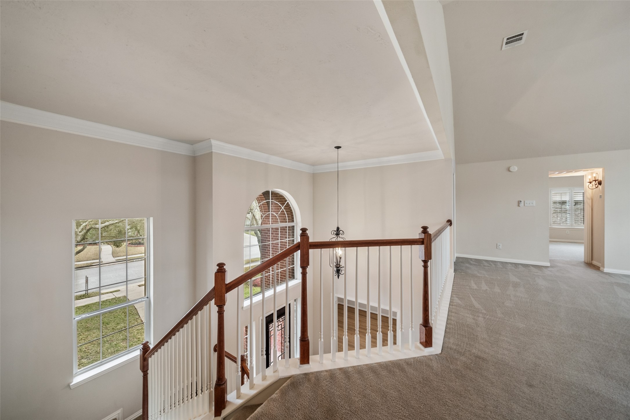 14803 Ramblebrook Humble, TX 77396 - Photo 30 of 45 a view of staircase with lots of windows and white walls