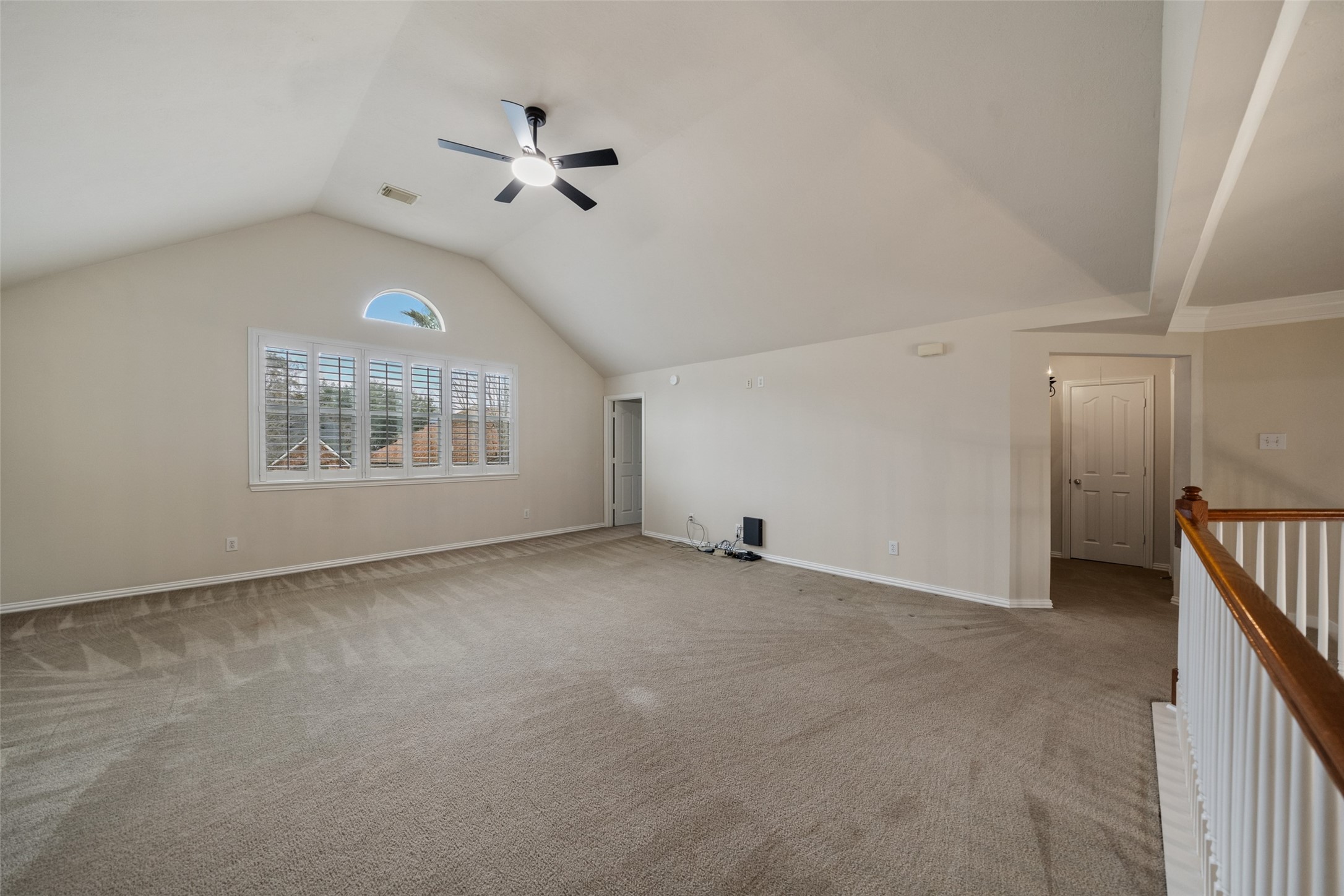 14803 Ramblebrook Humble, TX 77396 - Photo 31 of 45 an empty room with windows and fan