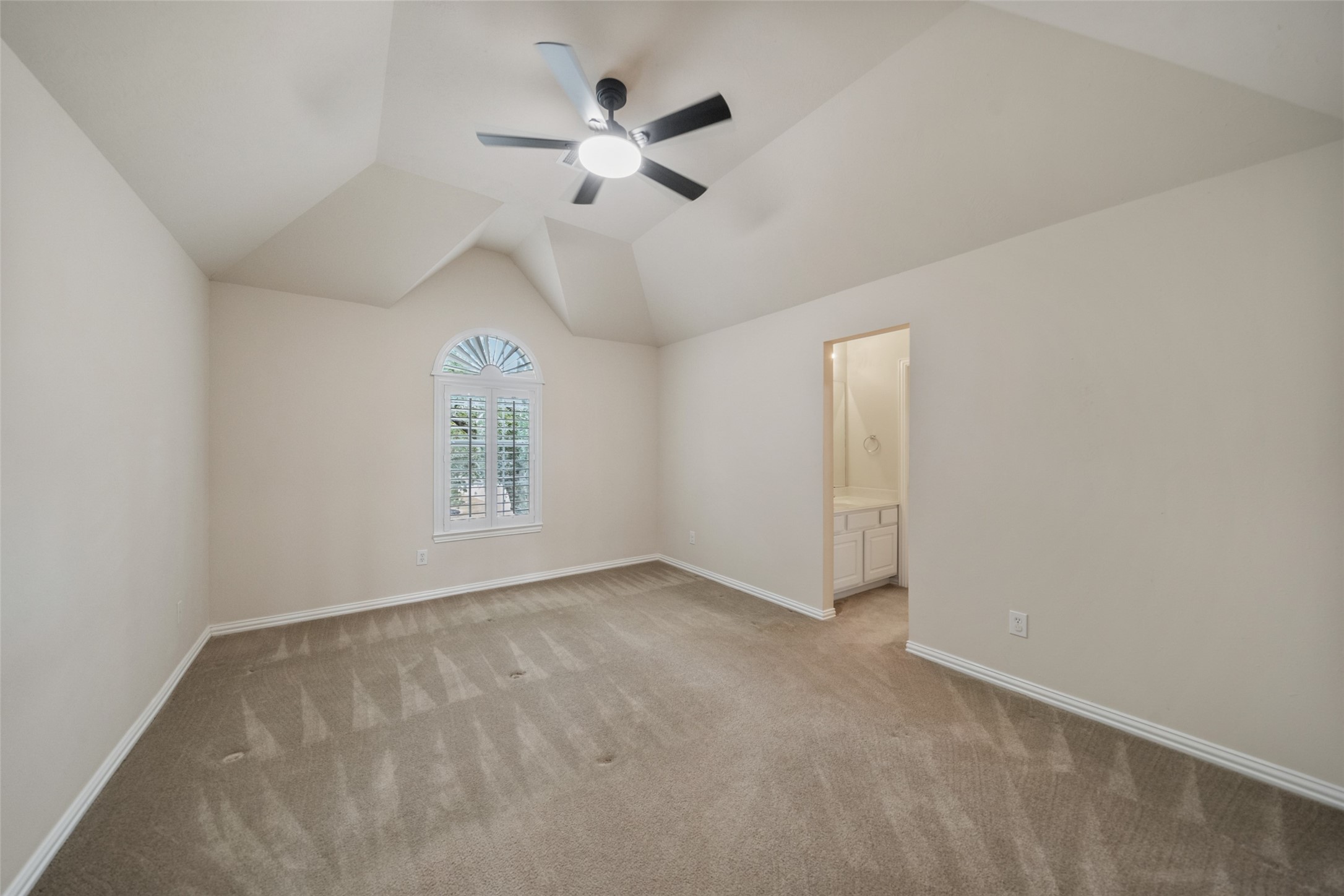 14803 Ramblebrook Humble, TX 77396 - Photo 34 of 45 an empty room with ceiling fan and window