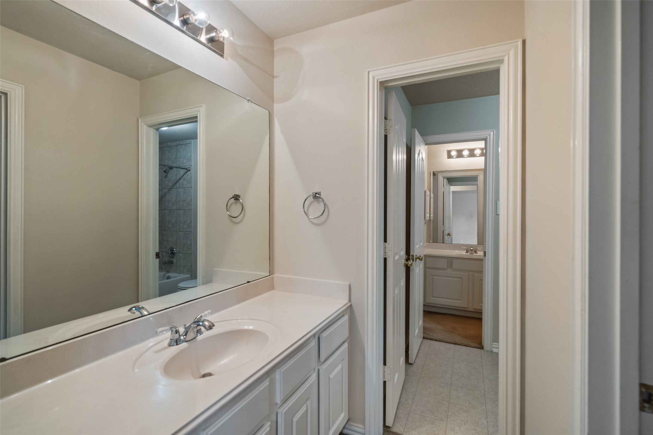 14803 Ramblebrook Humble, TX 77396 - Photo 38 of 45 a bathroom with a sink and a mirror