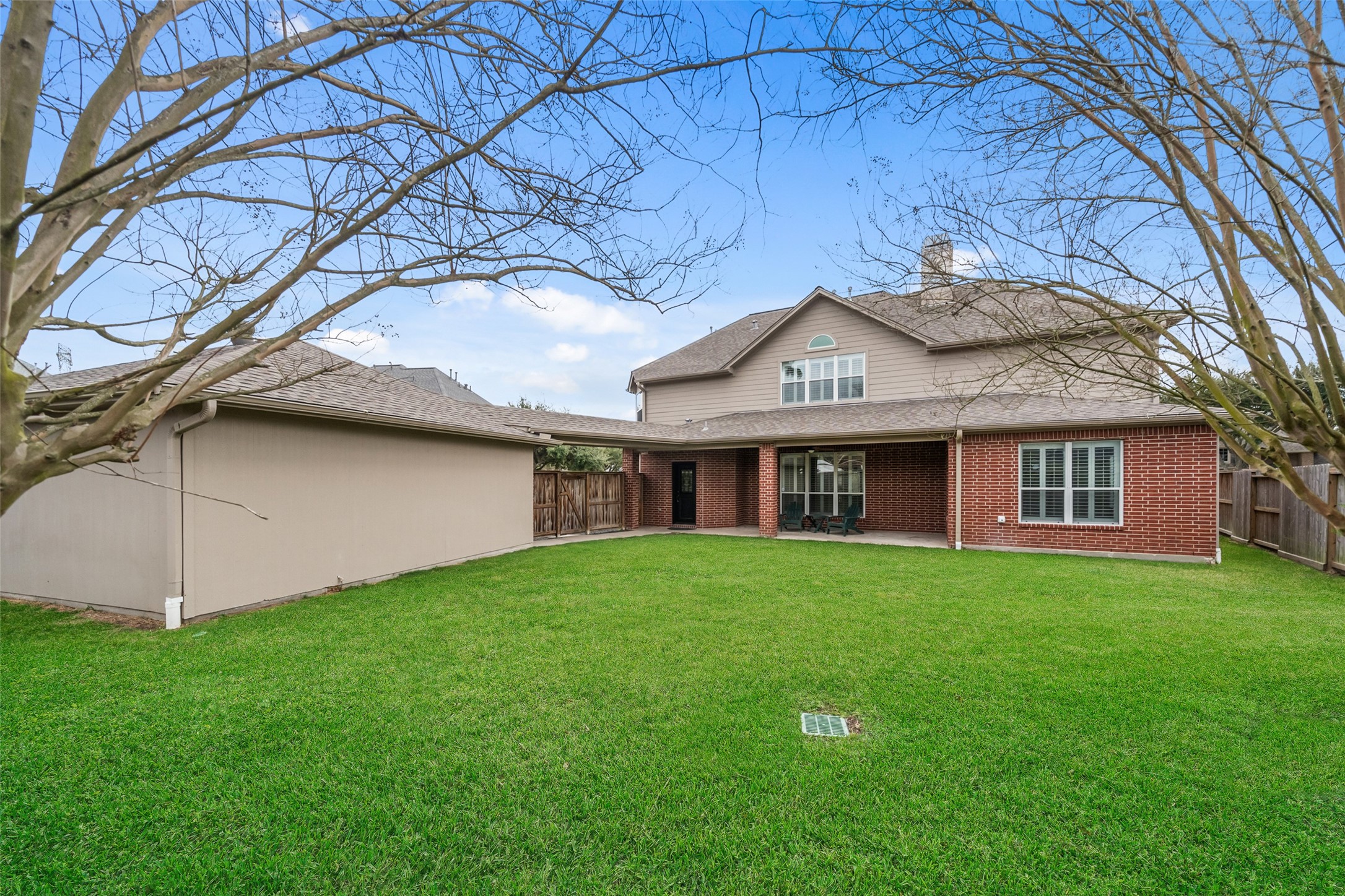 14803 Ramblebrook Humble, TX 77396 - Photo 43 of 45 a front view of a house with a garden and yard