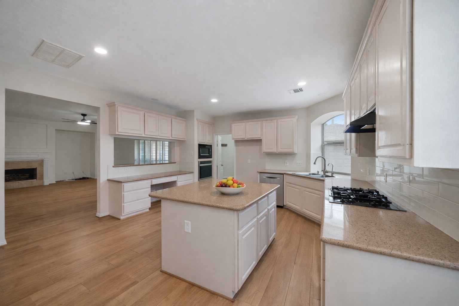 14803 Ramblebrook Humble, TX 77396 - Photo 5 of 45 a kitchen with refrigerator and cabinets