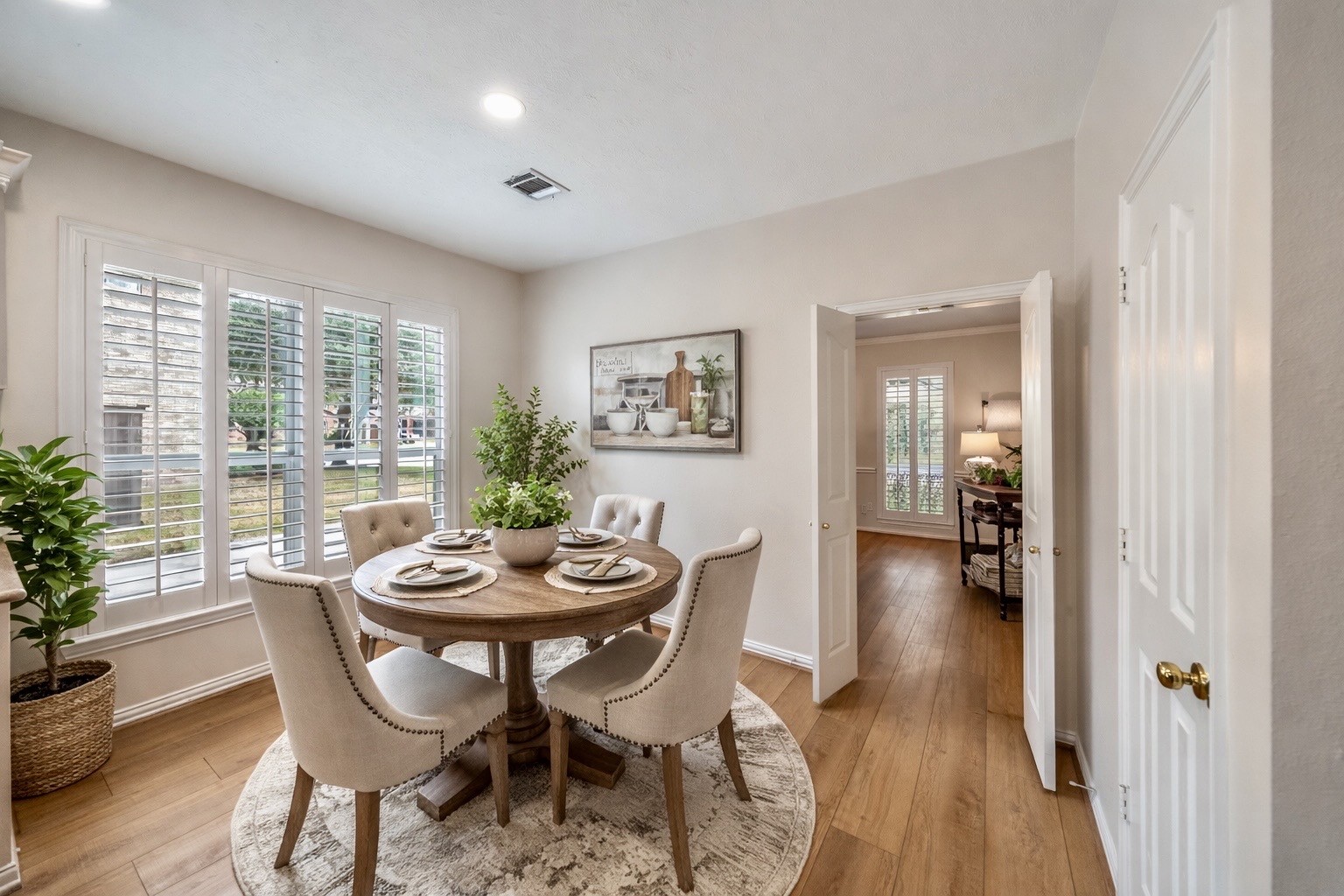 14803 Ramblebrook Humble, TX 77396 - Photo 6 of 45 a dining room with furniture and wooden floor