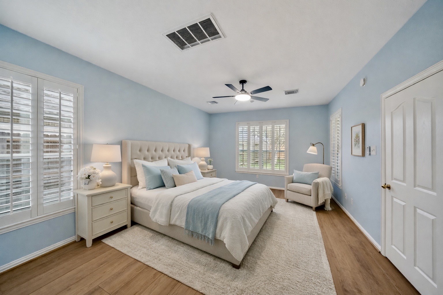 14803 Ramblebrook Humble, TX 77396 - Photo 7 of 45 a bedroom with a bed and a chandelier