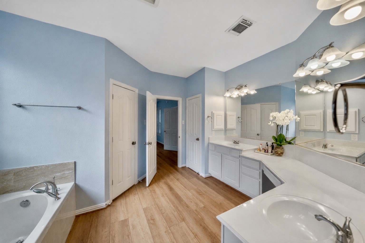 14803 Ramblebrook Humble, TX 77396 - Photo 9 of 45 a room with a white bed furniture and a dresser