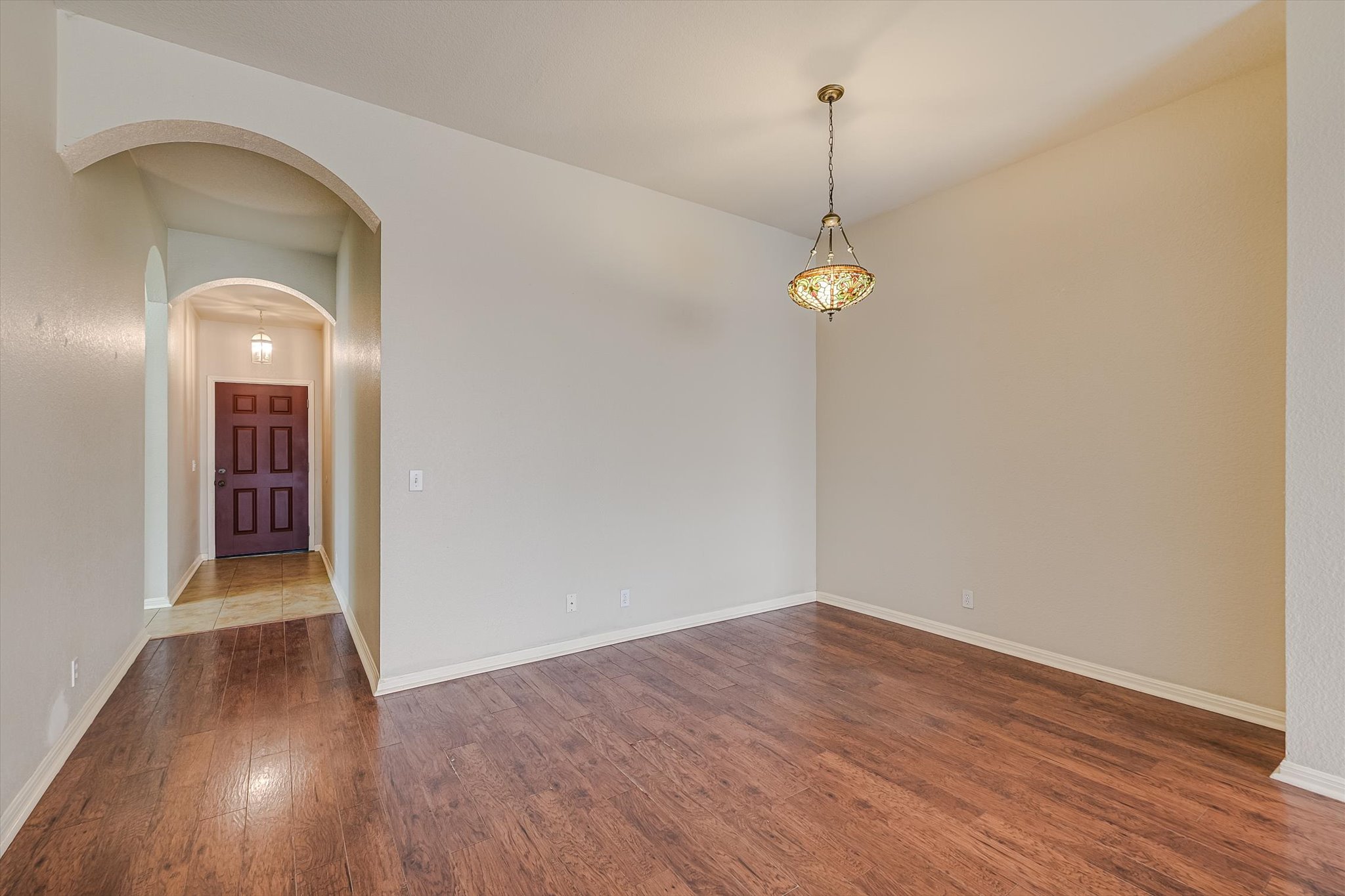 9616 Magna Carta Loop Austin, TX 78754 - Photo 15 of 28 a very nice looking room with wooden floor