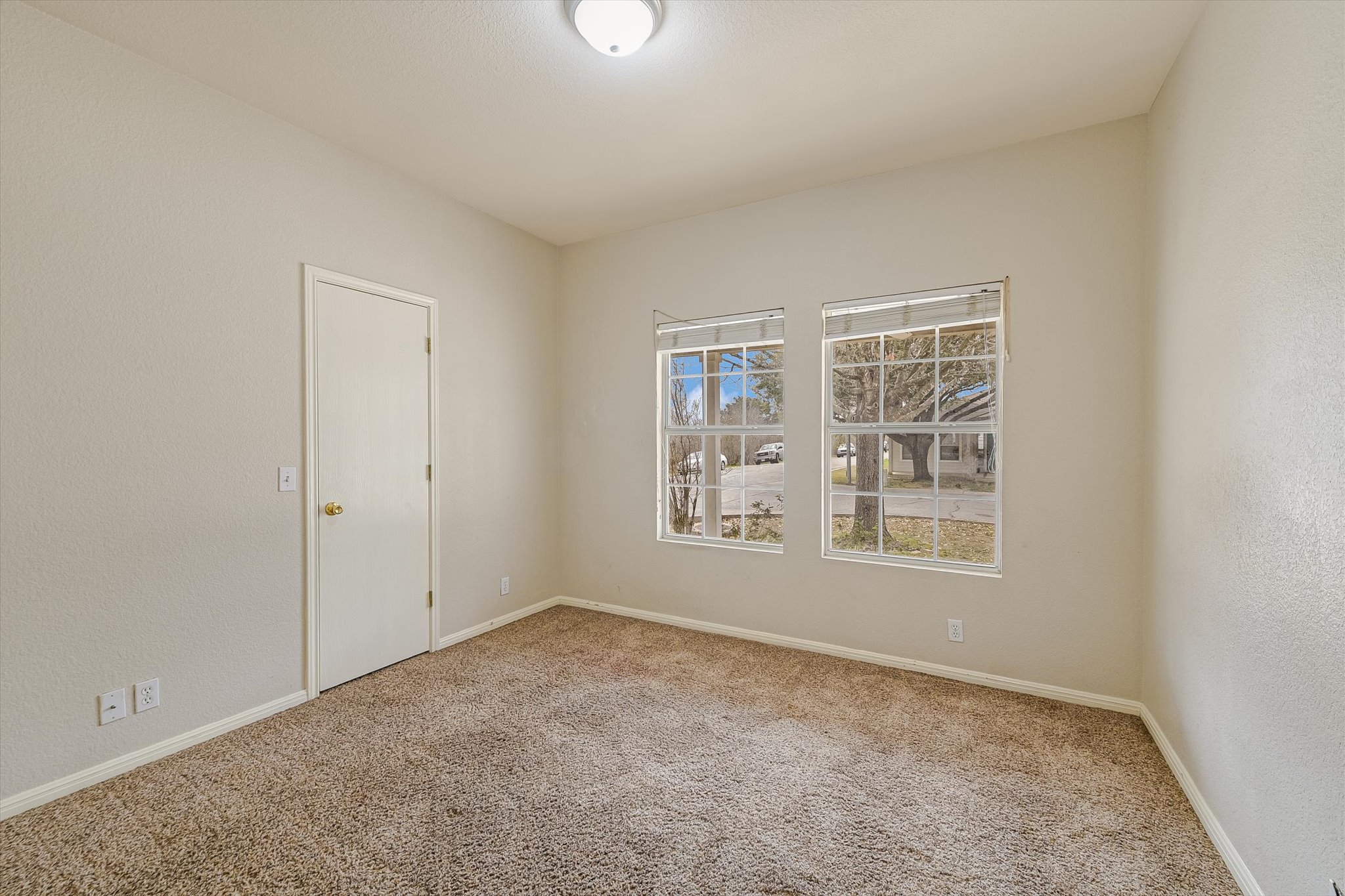 9616 Magna Carta Loop Austin, TX 78754 - Photo 23 of 28 an empty room with windows