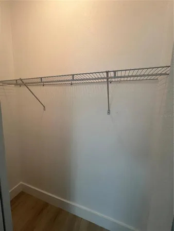 a view of small space with racks on the wall