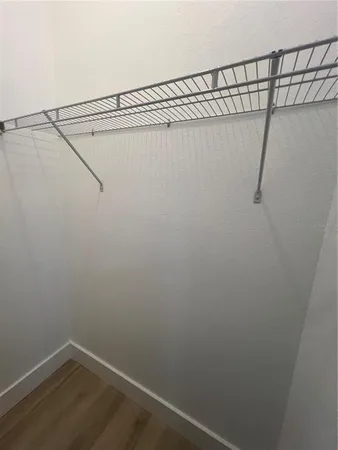 a view of a room with racks on the wall