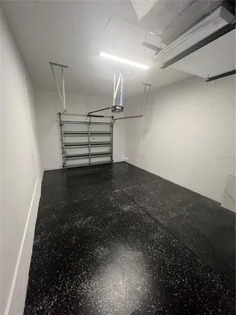 a view of a room with stairs and a rug