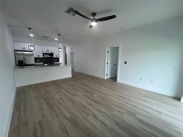 a view of a kitchen with a sink