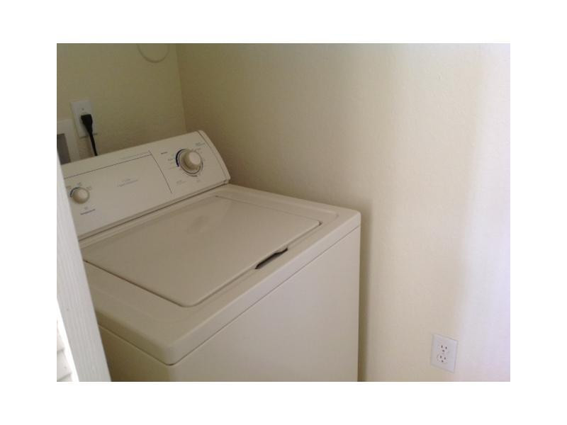 6464 West Sample Road, Unit B10 Coral Springs, FL 33067 - Photo 16 of 29 Laundry Room