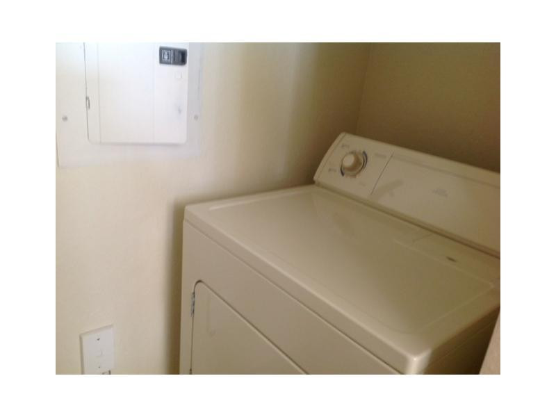 6464 West Sample Road, Unit B10 Coral Springs, FL 33067 - Photo 17 of 29 Laundry Room