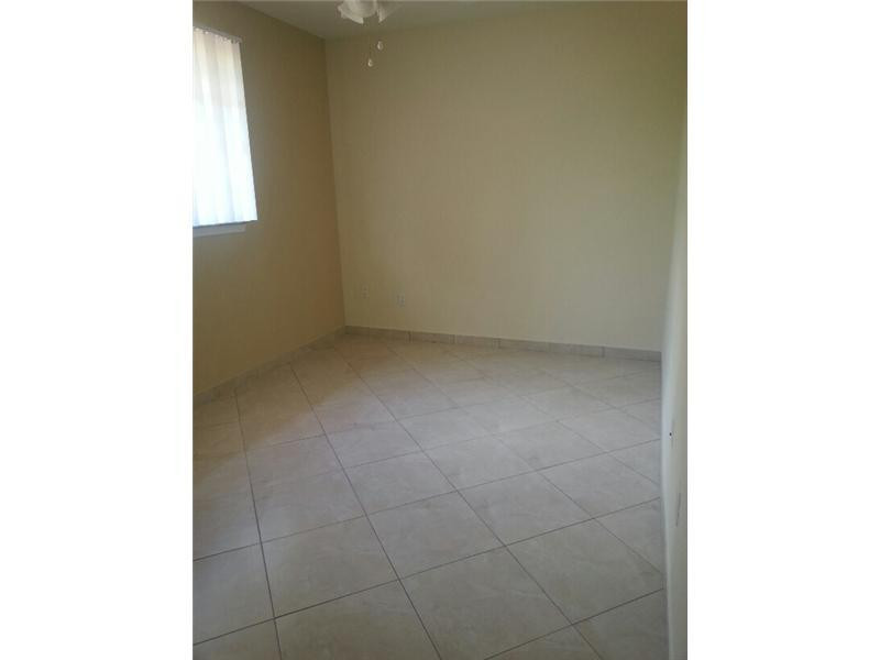 6464 West Sample Road, Unit B10 Coral Springs, FL 33067 - Photo 27 of 29 Bedroom