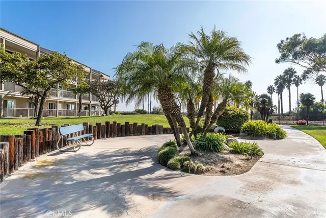 a view of a kitchen with kitchen island and a dining table chair