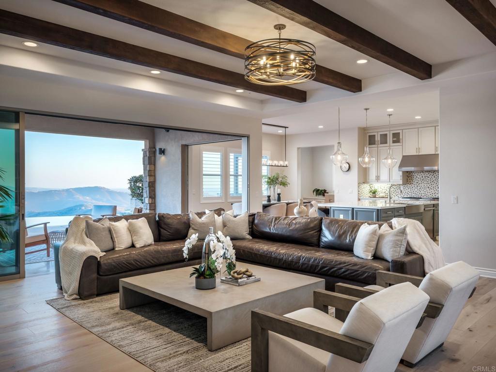 546 Ledge Street San Marcos, CA 92078 - Photo 11 of 75 a living room with furniture and a large window