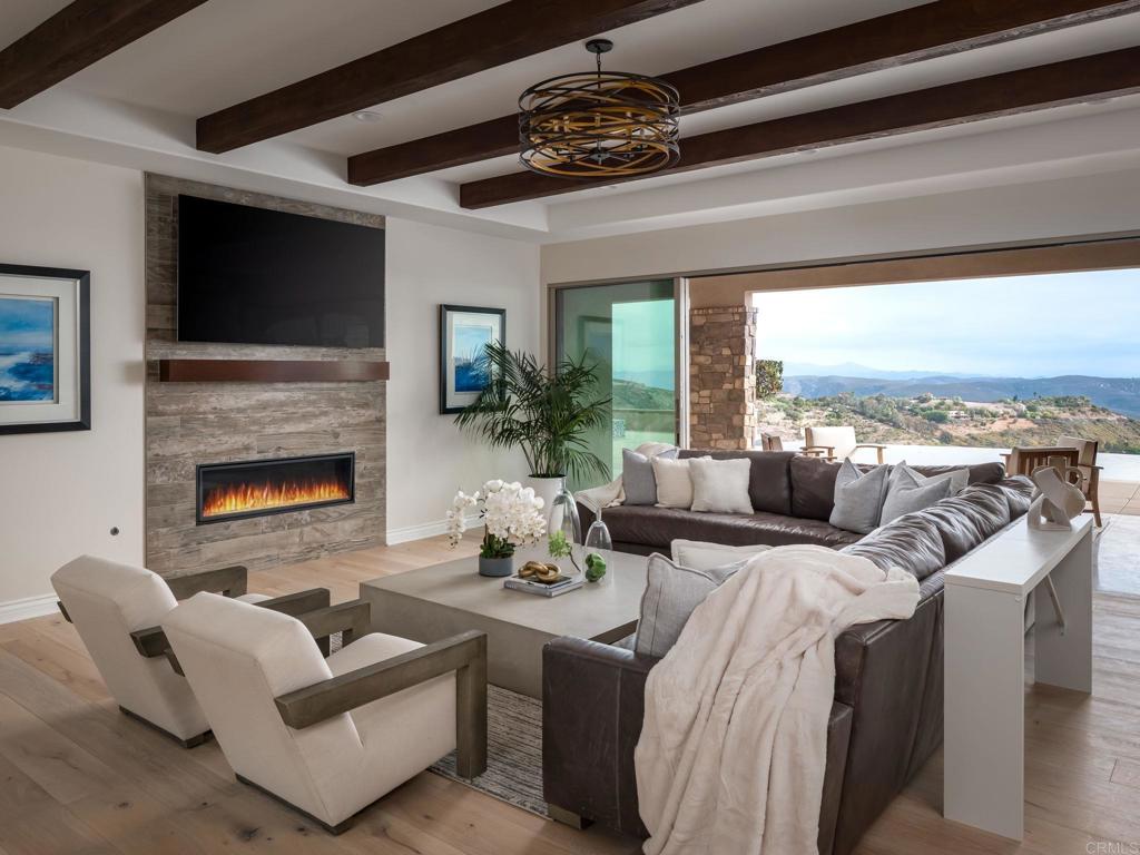 546 Ledge Street San Marcos, CA 92078 - Photo 12 of 75 a living room with furniture fireplace and flat screen tv
