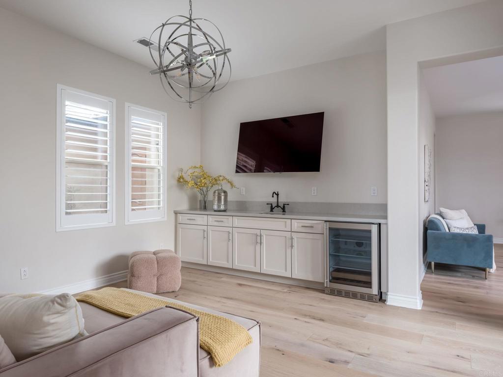 546 Ledge Street San Marcos, CA 92078 - Photo 25 of 75 a living room with furniture and a flat screen tv