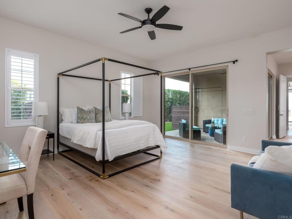 546 Ledge Street San Marcos, CA 92078 - Photo 26 of 75 a bedroom with a bed and a couch