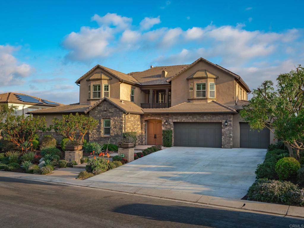 546 Ledge Street San Marcos, CA 92078 - Photo 3 of 75 a front view of a house with a yard