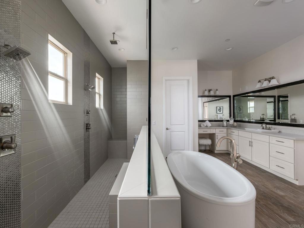 546 Ledge Street San Marcos, CA 92078 - Photo 34 of 75 a kitchen with white cabinets and stainless steel appliances