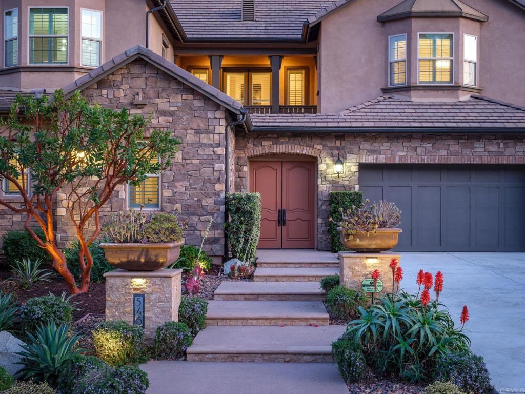 546 Ledge Street San Marcos, CA 92078 - Photo 54 of 75 a front view of a house with a yard