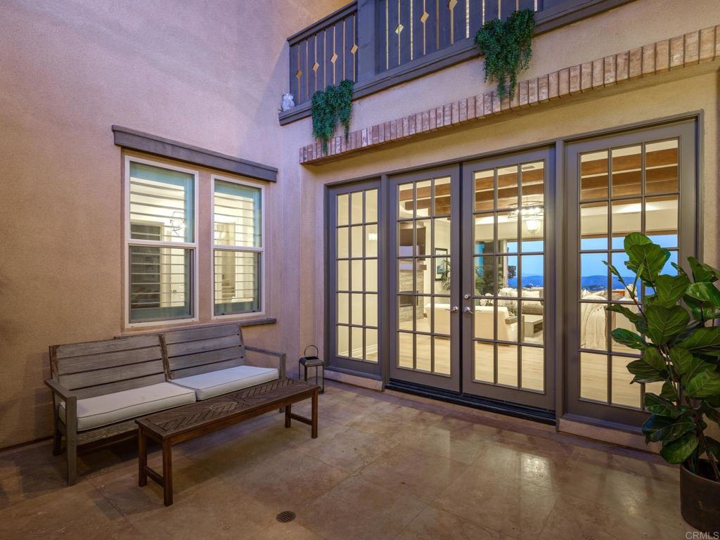 546 Ledge Street San Marcos, CA 92078 - Photo 55 of 75 a living room with furniture and a potted plant