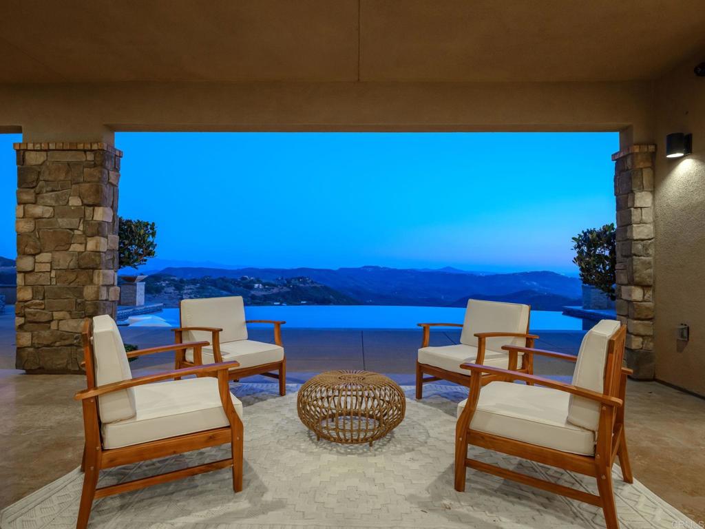 546 Ledge Street San Marcos, CA 92078 - Photo 61 of 75 a couch sitting in a room next to a blue wall with a chair