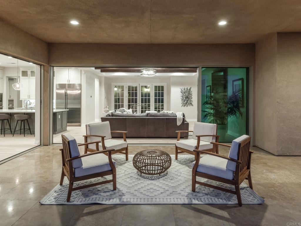 546 Ledge Street San Marcos, CA 92078 - Photo 63 of 75 a living room with furniture and a floor to ceiling window
