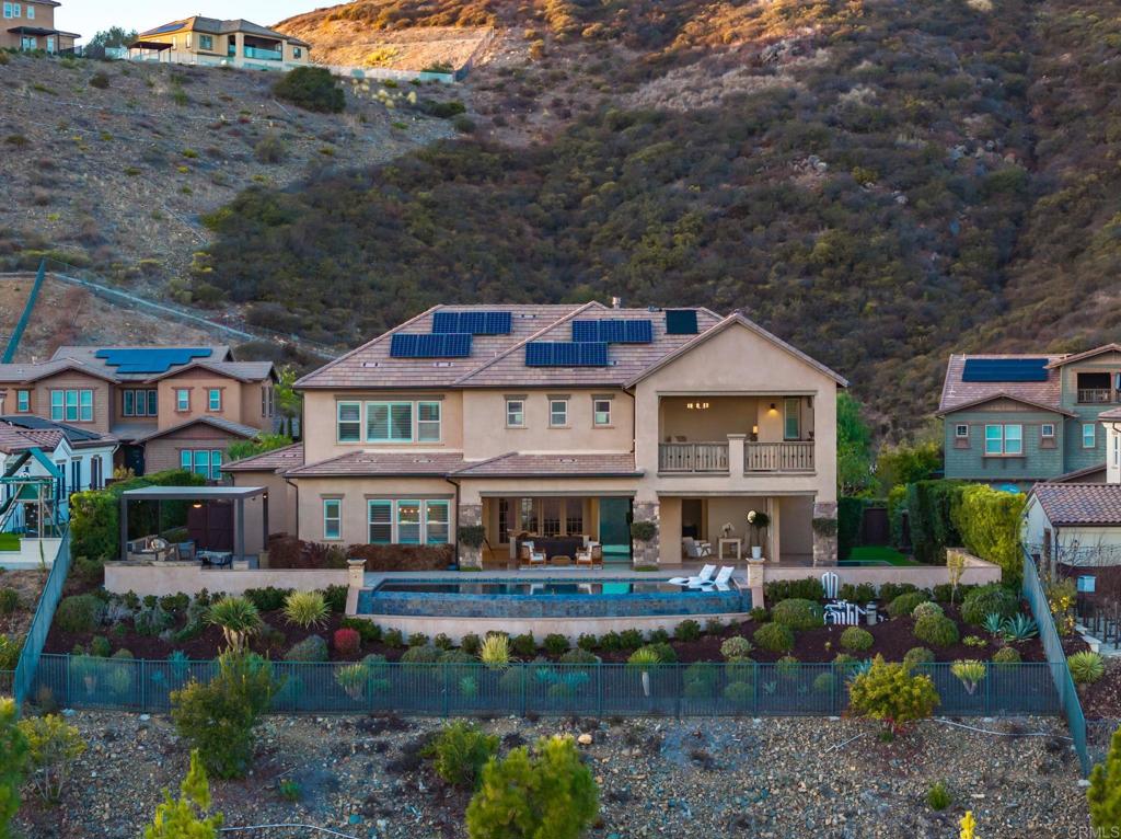 546 Ledge Street San Marcos, CA 92078 - Photo 65 of 75 a front view of a house with a garden