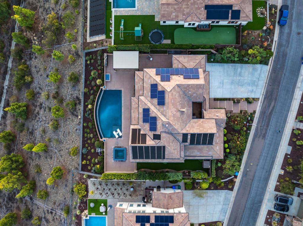 546 Ledge Street San Marcos, CA 92078 - Photo 67 of 75 an aerial view of a house with a yard and potted plants